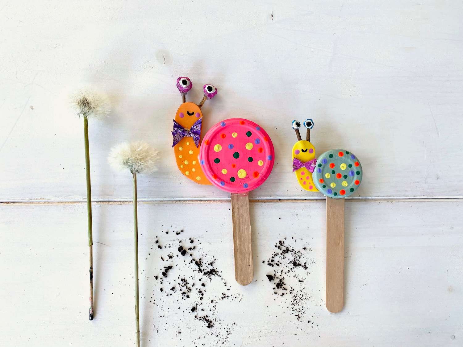 schnecken als gartendeko aus schraubdeckeln