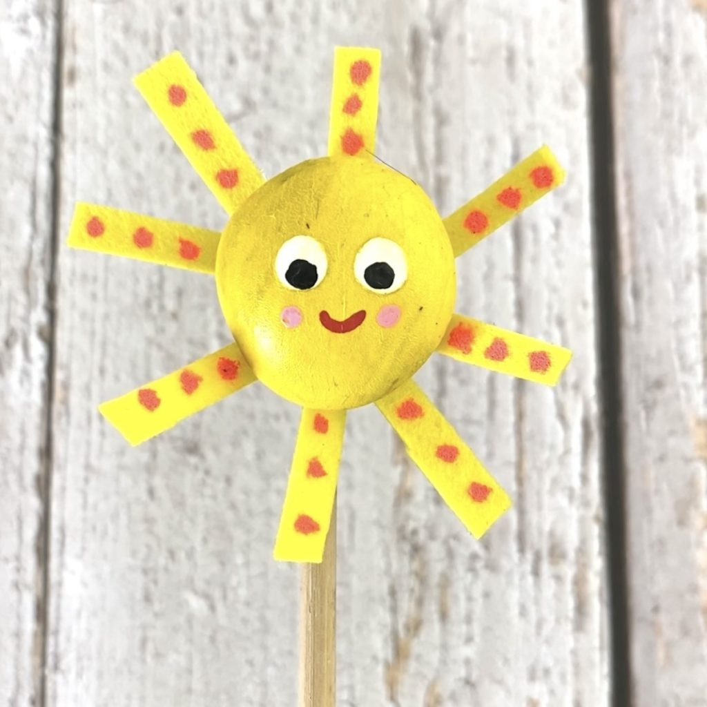 fruehling-basteln-im-kindergarten-steine-bemalen-sonne